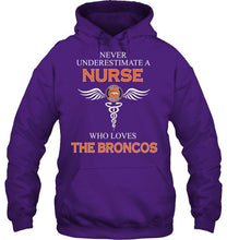Load image into Gallery viewer, Never underestimate a nurse who loves the Broncos Denver Broncos fan shirt