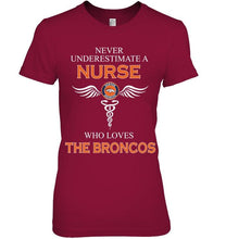 Load image into Gallery viewer, Never underestimate a nurse who loves the Broncos Denver Broncos fan shirt