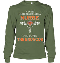 Load image into Gallery viewer, Never underestimate a nurse who loves the Broncos Denver Broncos fan shirt
