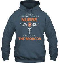 Load image into Gallery viewer, Never underestimate a nurse who loves the Broncos Denver Broncos fan shirt
