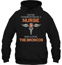 Load image into Gallery viewer, Never underestimate a nurse who loves the Broncos Denver Broncos fan shirt

