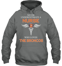 Load image into Gallery viewer, Never underestimate a nurse who loves the Broncos Denver Broncos fan shirt
