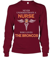 Load image into Gallery viewer, Never underestimate a nurse who loves the Broncos Denver Broncos fan shirt
