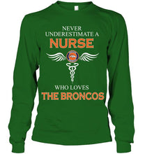 Load image into Gallery viewer, Never underestimate a nurse who loves the Broncos Denver Broncos fan shirt

