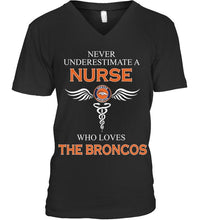Load image into Gallery viewer, Never underestimate a nurse who loves the Broncos Denver Broncos fan shirt
