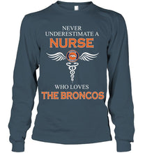 Load image into Gallery viewer, Never underestimate a nurse who loves the Broncos Denver Broncos fan shirt
