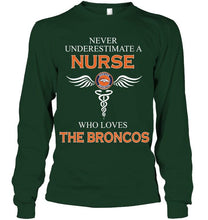 Load image into Gallery viewer, Never underestimate a nurse who loves the Broncos Denver Broncos fan shirt
