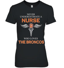 Load image into Gallery viewer, Never underestimate a nurse who loves the Broncos Denver Broncos fan shirt
